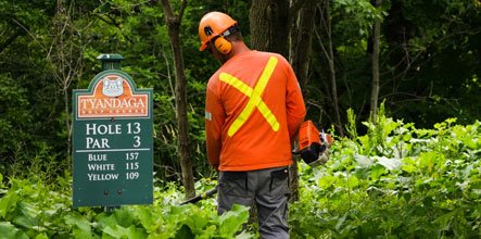 City landscape employee working in Tyandaga Golf Course.