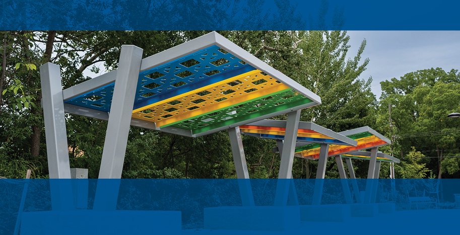 benches along Elgin Promenade with colourful overhang.