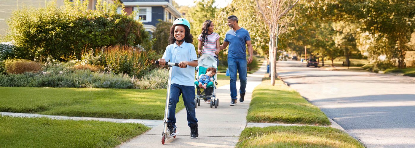 Banner - Investing in a flood-resistant Burlington Happy family walking in neighbourhood