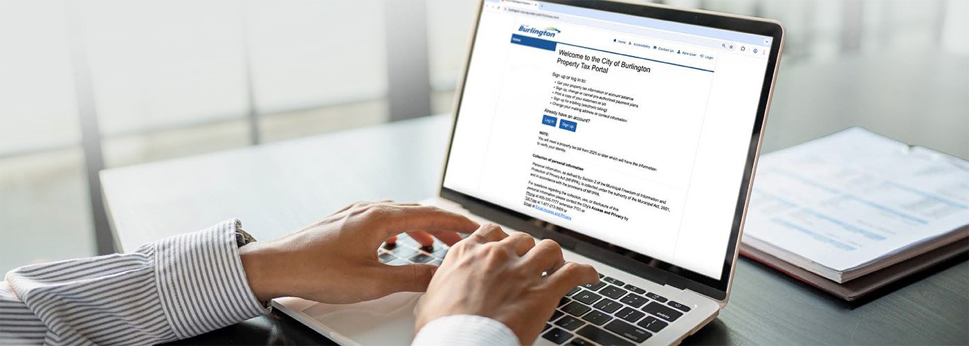 Manage your property tax account online Person using computer to access online property tax portal