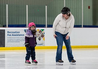 People ice skating during recreational drop-in-skating.