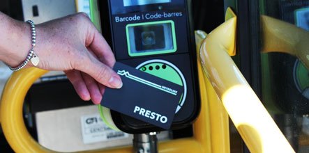 Person paying Burlington Transit fare with their PRESTO card.